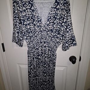 Black and White Midi Dress with V-Neck and Flutter Sleeves